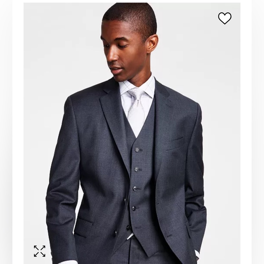 Rolled, cleaned, and stain-free Michael Kors men’s top suit piece in Navy Grey